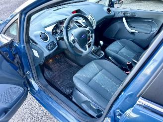Ford Fiesta 1.25i 82pk Titanium 5drs - 94dkm nap - airco - cruise - licht + regensensor + aut dimmend binnenspiegel - lmv picture 22