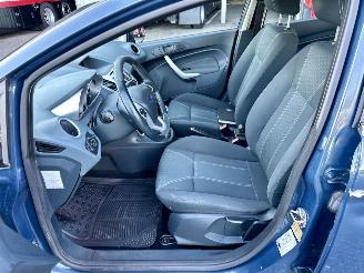Ford Fiesta 1.25i 82pk Titanium 5drs - 94dkm nap - airco - cruise - licht + regensensor + aut dimmend binnenspiegel - lmv picture 39