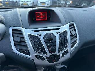 Ford Fiesta 1.25i 82pk Titanium 5drs - 94dkm nap - airco - cruise - licht + regensensor + aut dimmend binnenspiegel - lmv picture 34