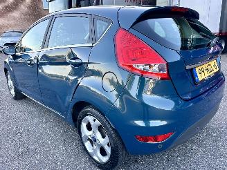 Ford Fiesta Gereserveerd 1.25i 82pk Titanium 5drs - 94dkm nap - airco - cruise - licht + regensensor + aut dimmend binnenspiegel - lmv picture 6