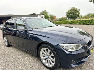 BMW 3-serie Gereserveerd Touring 320i 184pk 8-traps aut High Executive - nap - xenon - beige leer - stoelverw - navi - pdc - elektr klep picture 4
