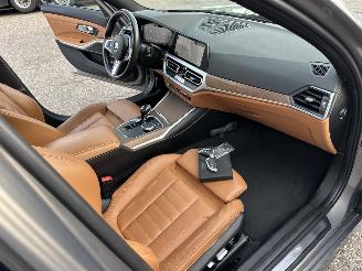 BMW 3-serie 320d 190pk aut + f1 xDrive High Exe sedan - schuifdak - harman/k - head up - keyless - 360cam - stuurverw picture 12