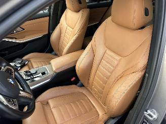 BMW 3-serie 320d 190pk aut + f1 xDrive High Exe sedan - schuifdak - harman/k - head up - keyless - 360cam - stuurverw picture 17