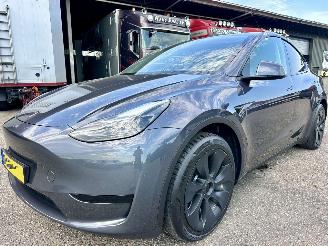 Tesla Model Y RWD 58kWh Aut - nap - 1e eig - pano - leer - stoelverw v+a - 19 inch - trekh - full self driving - camera picture 2
