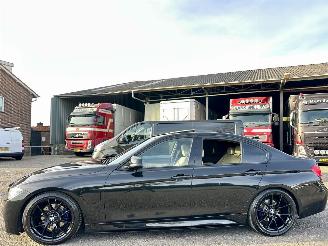 Schadeauto BMW 3-serie 330e 245pk 8-traps aut M-Sport - schuifdak - nap - spoilers - leer - verlaagd - pdc v+a - plug-in hybrid - facelift model 2016/7
