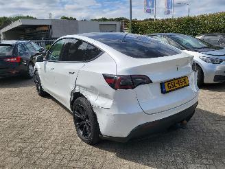Tesla  Tesla MODEL Y RWD 58 kWh range 455km nwprijs € 45000 picture 11