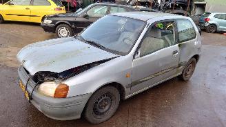 Salvage car Toyota Starlet 1996 1.3 16v 4EFE Grijs 1A0 onderdelen 1996/5