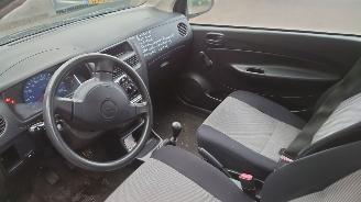 Daihatsu Cuore 2006 1.0 12v EJVE Zwart X05 onderdelen picture 12