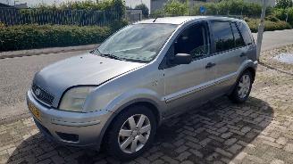 Salvage car Ford Fusion 2005 1.4 16v FXJA Grijs 74 Machine Silver onderdelen 2005/4