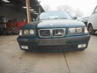 Damaged car BMW 3-serie 323ia  coupe 1997/1