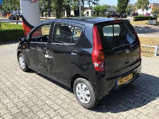 Daihatsu Cuore Cuore  1.0 trend AUTOMAAT lichte schade picture 4