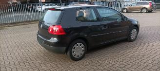 Volkswagen Golf Tour Edition 1.4 Benzine Climatecontrol CruiseControl Leren-Stuurwiel armsteun elek-ramen elektrische Spiegel met verwarming Centrale vergrendeling met afstandsbediening mistlampen Parkeersensoren achter afneembare trekhaak Metallic picture 3