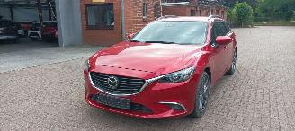 Mazda 6 Sportswagon Automatik Navi Led koplampen led achterlichten Headup Leren Sportstoelen Memory keyless Entry Blindspot Drivelane cruisecontrol met radar Stoelverwarming Lichtautomaat Regensensor Bose Soundsystem 19-inch velgen trekhaak picture 13
