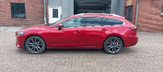Mazda 6 Sportswagon Automatik Navi Led koplampen led achterlichten Headup Leren Sportstoelen Memory keyless Entry Blindspot Drivelane cruisecontrol met radar Stoelverwarming Lichtautomaat Regensensor Bose Soundsystem 19-inch velgen trekhaak picture 10