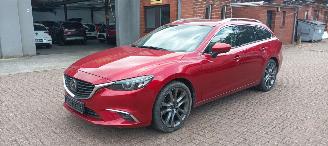 Mazda 6 Sportswagon Automatik Navi Led koplampen led achterlichten Headup Leren Sportstoelen Memory keyless Entry Blindspot Drivelane cruisecontrol met radar Stoelverwarming Lichtautomaat Regensensor Bose Soundsystem 19-inch velgen trekhaak picture 12