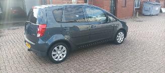 Mitsubishi Colt 1.3-16v Automaat 95pk Airco Lichtautomaat cruisecontrol Regensensor 4xElektrische ramen Elektrische-spiegels met verwarming Centrale vergrendeling met afstandsbediening Privacyglas leren stuurwiel mistlampen Metallic Lak Trekhaak  volledig Onderhouden! picture 6