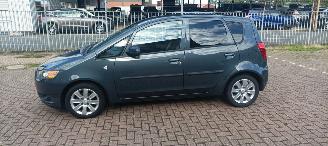 Mitsubishi Colt 1.3-16v Automaat 95pk Airco Lichtautomaat cruisecontrol Regensensor 4xElektrische ramen Elektrische-spiegels met verwarming Centrale vergrendeling met afstandsbediening Privacyglas leren stuurwiel mistlampen Metallic Lak Trekhaak  volledig Onderhouden! picture 2