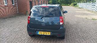Mitsubishi Colt 1.3-16v Automaat 95pk Airco Lichtautomaat cruisecontrol Regensensor 4xElektrische ramen Elektrische-spiegels met verwarming Centrale vergrendeling met afstandsbediening Privacyglas leren stuurwiel mistlampen Metallic Lak Trekhaak  volledig Onderhouden! picture 5
