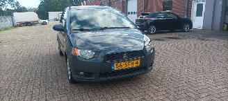 Mitsubishi Colt 1.3-16v Automaat 95pk Airco Lichtautomaat cruisecontrol Regensensor 4xElektrische ramen Elektrische-spiegels met verwarming Centrale vergrendeling met afstandsbediening Privacyglas leren stuurwiel mistlampen Metallic Lak Trekhaak  volledig Onderhouden! picture 10