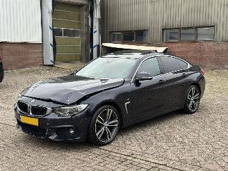Schadeauto BMW 4-serie 440i Xdrive 326Pk M-Pakket Centennial High Executive Individual Head-Up 360Camera Memory 2016/8