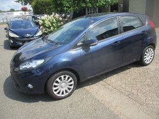 damaged passenger cars Ford Fiesta 1.25 TITANIUM 5 DEURS AIRCO 2012/9