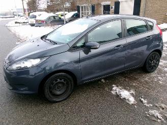 Damaged car Ford Fiesta 1.25 LIMITED AIRCO 2011/1