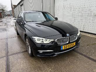 Schadeauto BMW 3-serie 320i Luxury Line Executive 2018/7