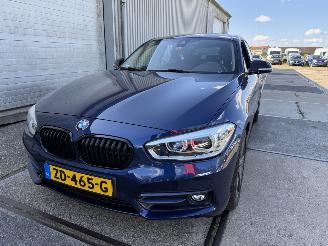 Damaged car BMW 1-serie 118i Sport Line Automaat 2019/4