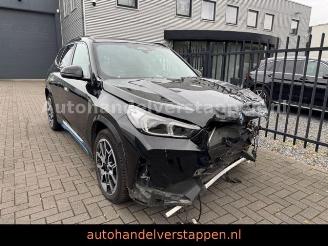 Schadeauto BMW iX1 30 xDrive xLine 230KW Harman Pano 2023/6