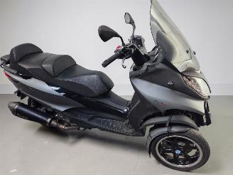 krockskadad bil bromfiets Piaggio  MP3 2017/9