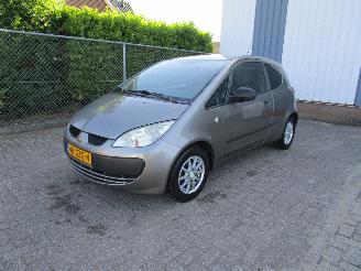 Coche accidentado Mitsubishi Colt 1.1 Navi Airco 2008/9